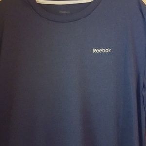 Long sleeve Reebok shirt.